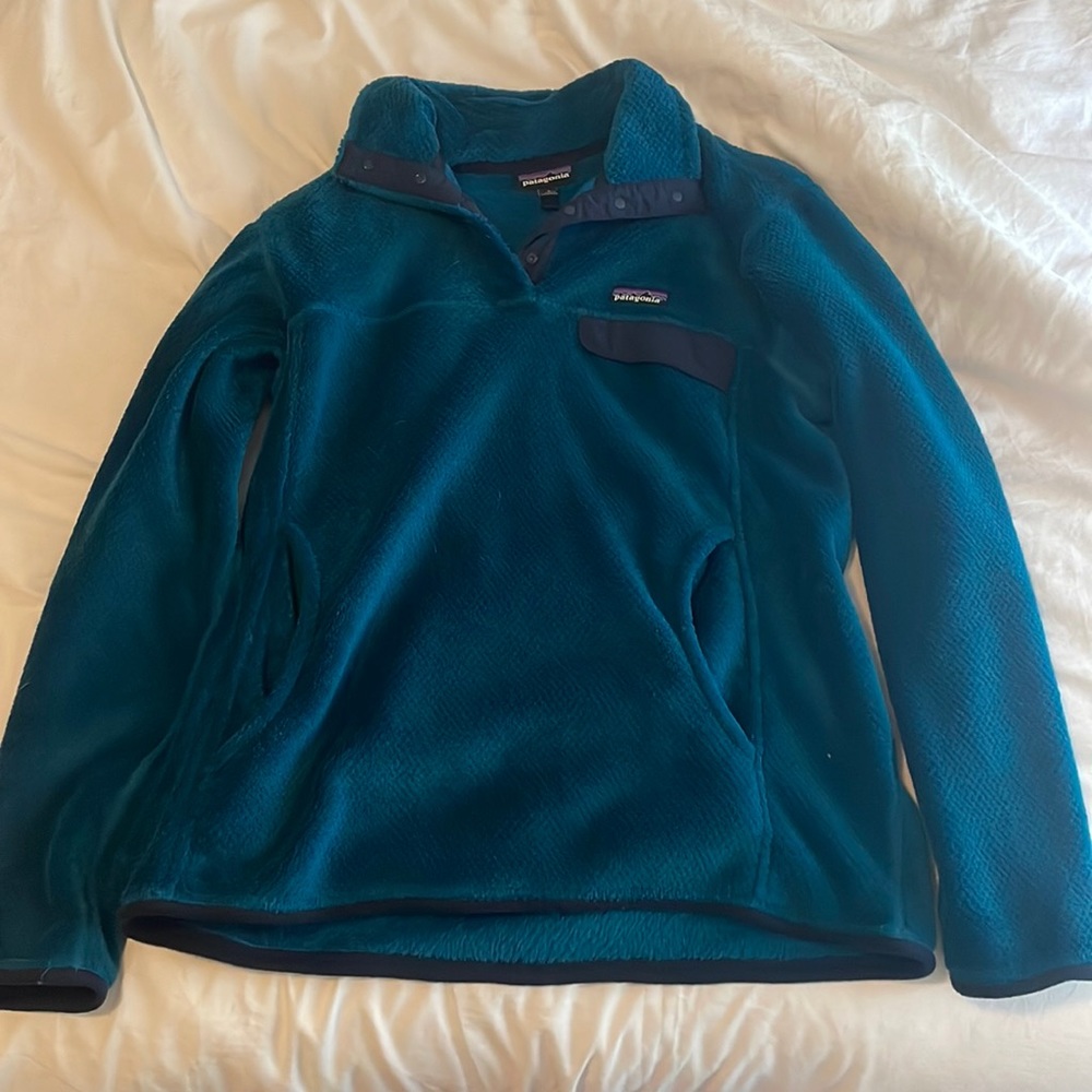 Dark teal colored Patagonia sweatshirt